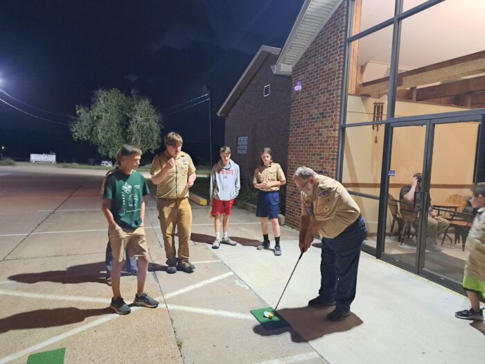 Scouts working on the Golf Merit Badge