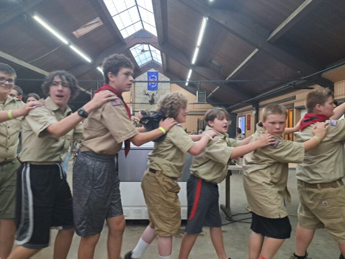 Scouts doing a Conga Line during Dinner