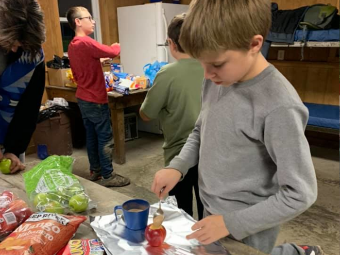 a scout learning to cook