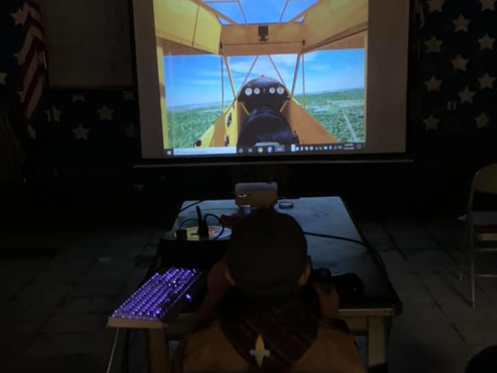 scouts learning about flight simulators